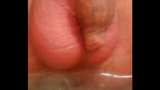 Masturbating my rose with a jet of hot water from the shower